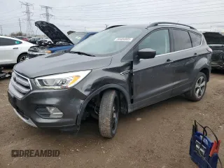 2017 Ford Escape SE z VIN 1FMCU9G92HUA76927, wystawiony jako Copart lot #50404805 z przebiegiem 129 815 mil mil oraz Szkoda całkowita • Salvage title. Historia ofert i sprzedaży dostępna na DreamBid. Obrazek 1.