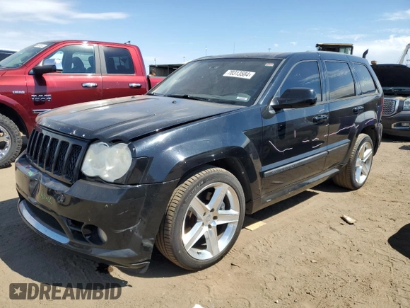 2008 Jeep Grand Cherokee SRT-8 with VIN 1J8HR78308C174606, listed as a Copart auction lot 70313584 with 169,765 mi miles and Salvage Title. Bid and sale history available at carsss.com. Image 1.