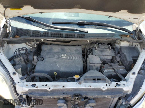 2014 Toyota Sienna L with VIN 5TDZK3DCXES463632, listed as a Copart auction lot 69957284 with 206,250 mi miles and Salvage Title. Bid and sale history available at carsss.com. Image 12.