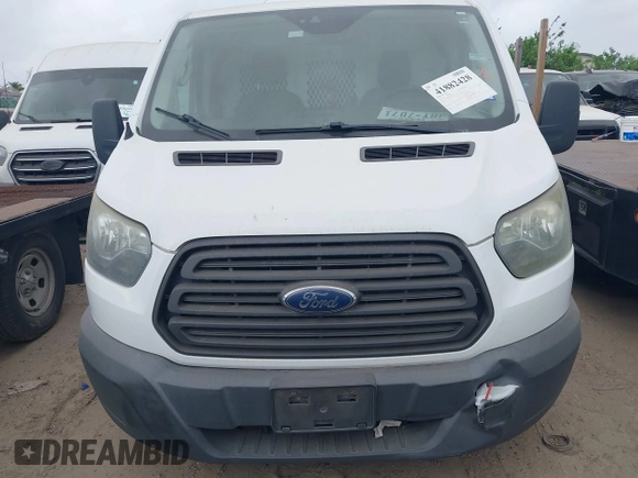 2016 Ford Transit Cargo with VIN 1FTYE1ZM6GKB31092, listed as a IAAI auction lot 41882428 with 261,937 mi miles and . Bid and sale history available at carsss.com. Image 12.