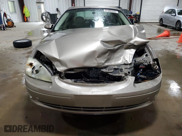 2003 Ford Taurus SE Standard with VIN 1FAFP53U83G228072, listed as a Copart auction lot 57486335 with 93,451 mi miles and Salvage title. Bid and sale history available at DreamBid. Image 5.
