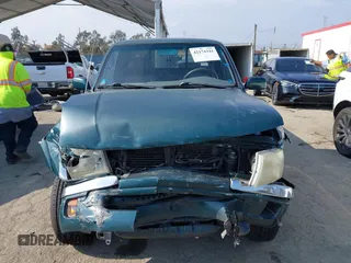 1999 Toyota Tacoma PreRunner with VIN 4TASN92N4XZ519660, listed as a IAAI auction lot 42174341 with 166,074 mi miles and . Bid and sale history available at DreamBid. Image 13.