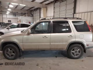 2000 Honda CR-V SE with VIN JHLRD1879YC037127, listed as a IAAI auction lot 41285624 with 246,170 mi miles. Bid and sale history available at carsss.com. Image 14.