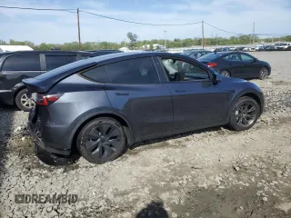 2024 Tesla Model Y Long Range with VIN 7SAYGDEE7RA307013, listed as a Copart auction lot 54767595 with 12,953 mi miles and Salvage Title. Bid and sale history available at DreamBid. Image 3.