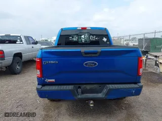 2015 Ford F-150 XL with VIN 1FTEW1CG1FKD20413, listed as a IAAI auction lot 41694489 with 147,431 mi miles. Bid and sale history available at carsss.com. Image 16.