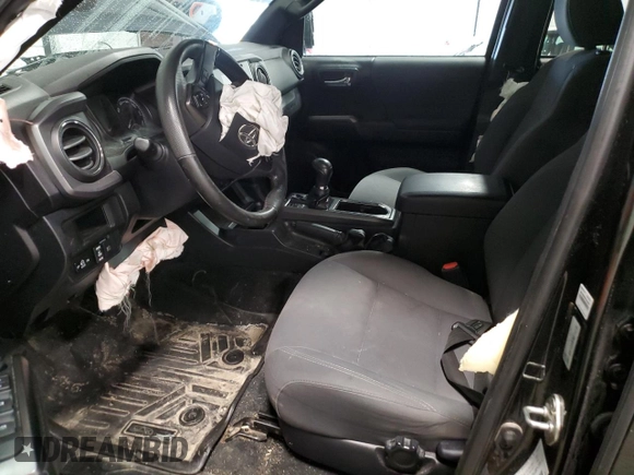 2019 Toyota Tacoma SR z VIN 5TFCZ5AN1KX196812, wystawiony jako Copart lot #51372065 z przebiegiem Nie podano mil oraz Szkoda całkowita • Salvage title. Historia ofert i sprzedaży dostępna na DreamBid. Obrazek 7.