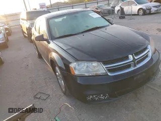 2014 Dodge Avenger SE with VIN 1C3CDZAB3EN148292, listed as a IAAI auction lot 42043642 with 134,676 mi miles. Bid and sale history available at carsss.com. Image 1.