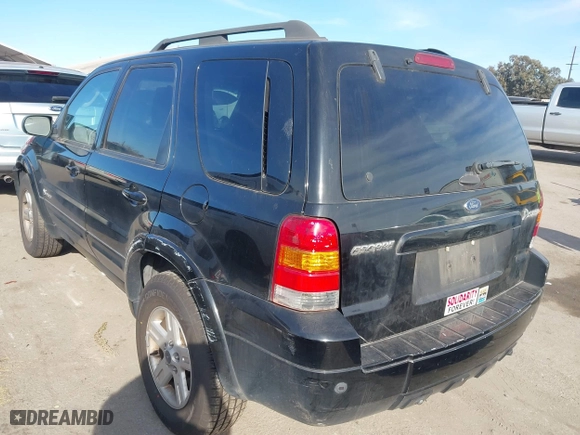 2007 Ford Escape Hybrid with VIN 1FMCU59H77KB97749, listed as a IAAI auction lot 41403183 with 1 mi miles. Bid and sale history available at carsss.com. Image 3.