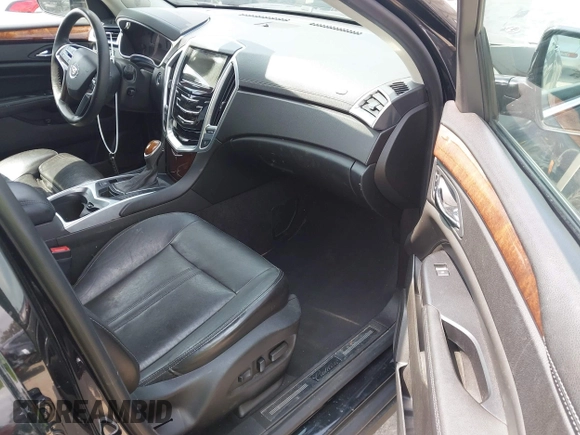 2014 Cadillac SRX Luxury Collection with VIN 3GYFNBE34ES639647, listed as a IAAI auction lot 42108140 with 99,740 mi miles and . Bid and sale history available at DreamBid. Image 5.