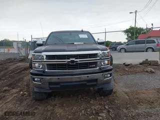 2015 Chevrolet Silverado 1500 LT with VIN 3GCUKREC9FG142970, listed as a IAAI auction lot 42064960 with 77,479 mi miles. Bid and sale history available at carsss.com. Image 12.