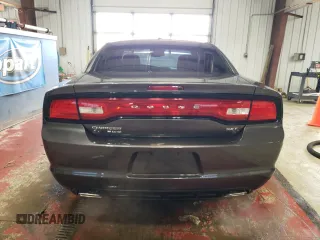 2014 Dodge Charger SXT with VIN 2C3CDXJG2EH211164, listed as a Copart auction lot 68972554 with 125,539 mi miles and Salvage Title. Bid and sale history available at carsss.com. Image 6.