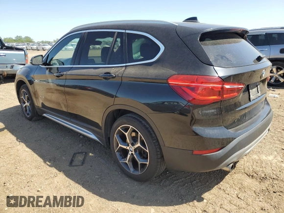 2018 BMW X1 xDrive28i with VIN WBXHT3C38J5K28174, listed as a Copart auction lot 57333385 with 50,064 mi miles and Salvage title. Bid and sale history available at DreamBid. Image 2.