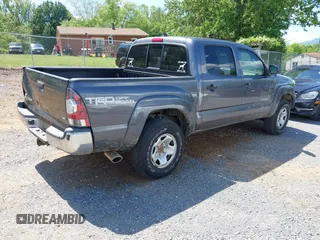 2014 Toyota Tacoma with VIN 5TFLU4ENXEX103129, listed as a IAAI auction lot 42230976 with 191,982 mi miles and . Bid and sale history available at DreamBid. Image 4.