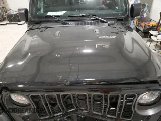 2024 Jeep Gladiator Sport z VIN 1C6HJTAG2RL103503, wystawiony jako Copart lot #82096704 z przebiegiem Nie podano mil oraz Szkoda całkowita • Salvage title. Historia ofert i sprzedaży dostępna na DreamBid. Obrazek 11.