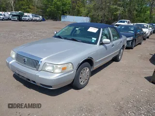 2007 Mercury Grand Marquis GS with VIN 2MEFM74V67X625848, listed as a IAAI auction lot 42178025 with 112,546 mi miles and . Bid and sale history available at DreamBid. Image 2.
