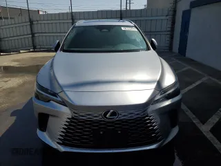 2023 Lexus RX with VIN JTJCHMAA6P2009141, listed as a Copart auction lot 73084584 with 14,600 mi miles and Clean Title. Bid and sale history available at carsss.com. Image 5.