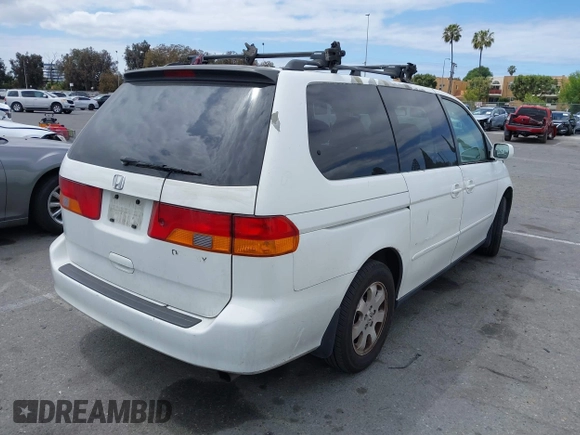 2003 Honda Odyssey EX-L with VIN 5FNRL18973B113215, listed as a IAAI auction lot 42052917 with Not Provided miles and . Bid and sale history available at DreamBid. Image 4.
