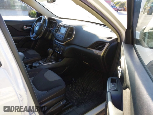 2016 Jeep Cherokee Sport with VIN 1C4PJMAB9GW143085, listed as a IAAI auction lot 42803158 with 268,076 mi miles and . Bid and sale history available at DreamBid. Image 5.