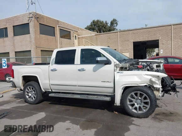 2014 GMC Sierra 1500 Denali z VIN 3GTU2WEJ3EG551266, wystawiony jako IAAI lot #41631624 z przebiegiem 120 214 mil mil oraz . Historia ofert i sprzedaży dostępna na DreamBid. Obrazek 14.