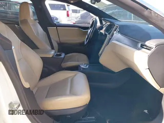 2016 Tesla Model S 70 with VIN 5YJSA1E16GF164264, listed as a IAAI auction lot 40976293 with 68,940 mi miles and . Bid and sale history available at DreamBid. Image 5.