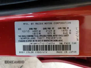 2014 Mazda 3 i Touring with VIN JM1BM1V71E1156056, listed as a Copart auction lot 52010625 with 105,811 mi miles and Salvage Title. Bid and sale history available at DreamBid. Image 13.