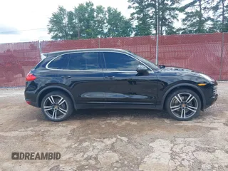 2014 Porsche Cayenne with VIN WP1AA2A26ELA97738, listed as a IAAI auction lot 42445351 with 118,381 mi miles and . Bid and sale history available at DreamBid. Image 13.
