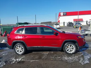 2015 Jeep Cherokee Latitude with VIN 1C4PJLCB4FW730607, listed as a IAAI auction lot 41738845 with 202,216 mi miles and . Bid and sale history available at DreamBid. Image 13.