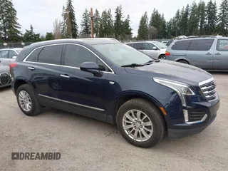 2017 Cadillac XT5 FWD with VIN 1GYKNARS2HZ188557, listed as a IAAI auction lot 41840764 with 104,524 mi miles. Bid and sale history available at carsss.com. Image 13.