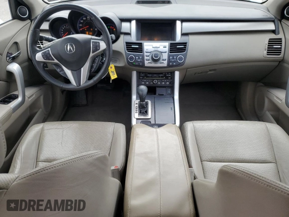 2009 Acura RDX Technology z VIN 5J8TB18549A008060, wystawiony jako Copart lot #50881085 z przebiegiem 101 968 mil mil oraz Szkoda całkowita • Salvage title. Historia ofert i sprzedaży dostępna na DreamBid. Obrazek 8.