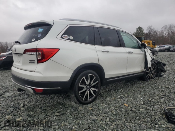 2020 Honda Pilot Touring 8-Passenger with VIN 5FNYF6H95LB053631, listed as a Copart auction lot 47732865 with 67,728 mi miles and Salvage Title. Bid and sale history available at DreamBid. Image 3.