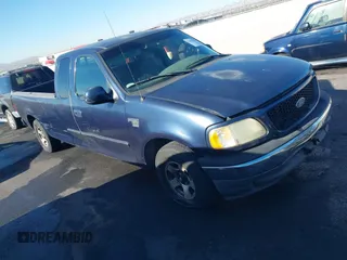 2002 Ford F-150 XL with VIN 1FTRX17L12NA31966, listed as a IAAI auction lot 41885766 with 212,398 mi miles. Bid and sale history available at carsss.com. Image 1.