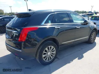 2018 Cadillac XT5 Luxury FWD with VIN 1GYKNCRS5JZ121954, listed as a IAAI auction lot 41627999 with NaN miles. Bid and sale history available at carsss.com. Image 4.