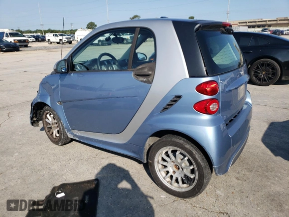 2013 Smart fortwo Pure with VIN WMEEJ3BA6DK674305, listed as a Copart auction lot 56100835 with 78,158 mi miles and Salvage title. Bid and sale history available at DreamBid. Image 2.