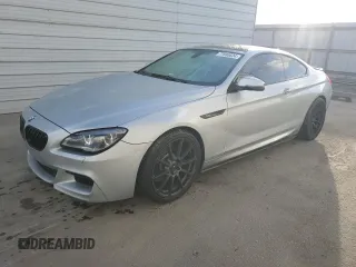 2017 BMW 6 Series z VIN WBA6H1C59HD933073, wystawiony jako Copart lot #77680624 z przebiegiem 55 230 mil mil oraz Szkoda całkowita • Salvage title. Historia ofert i sprzedaży dostępna na DreamBid. Obrazek 1.