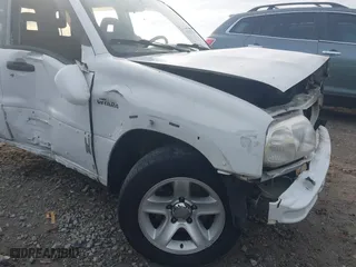 2001 Suzuki Grand Vitara with VIN JS3TE62V214154487, listed as a IAAI auction lot 41116104 with 1 mi miles. Bid and sale history available at carsss.com. Image 19.