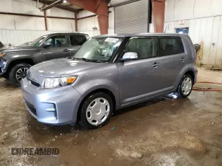 2012 Scion xB with VIN JTLZE4FE8CJ018316, listed as a Copart auction lot 46035275 with 116,398 mi miles and Salvage Title. Bid and sale history available at DreamBid. Image 1.