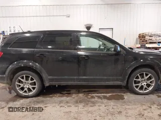 2016 Dodge Journey R/T with VIN 3C4PDDEGXGT150789, listed as a IAAI auction lot 41566623 with 162,471 mi miles and . Bid and sale history available at DreamBid. Image 13.