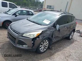 2013 Ford Escape SEL with VIN 1FMCU0HX4DUC83404, listed as a IAAI auction lot 41285095 with 199,024 mi miles. Bid and sale history available at carsss.com. Image 2.
