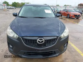 2015 Mazda CX-5 Touring with VIN JM3KE2CY5F0449195, listed as a IAAI auction lot 41894567 with 124,694 mi miles and . Bid and sale history available at DreamBid. Image 12.