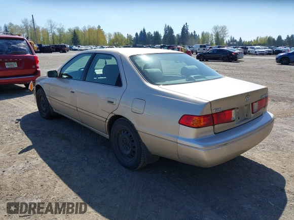2001 Toyota Camry CE with VIN JT2BG22K910581703, listed as a IAAI auction lot 42020085 with 107,035 mi miles. Bid and sale history available at carsss.com. Image 3.