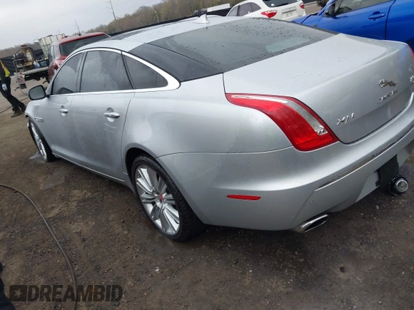 2015 Jaguar XJ with VIN SAJWA2GZ8F8V83551, listed as a IAAI auction lot 41909403 with 112,098 mi miles. Bid and sale history available at carsss.com. Image 3.