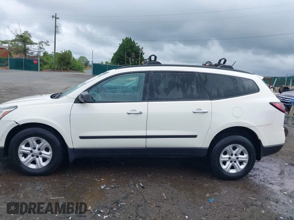 2015 Chevrolet Traverse LS z VIN 1GNKVFED4FJ197970, wystawiony jako IAAI lot #42020771 z przebiegiem 128 876 mil mil oraz . Historia ofert i sprzedaży dostępna na DreamBid. Obrazek 14.
