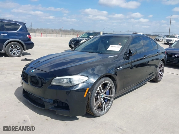 2013 BMW M5 with VIN WBSFV9C54DD095547, listed as a IAAI auction lot 41601733 with 1 mi miles. Bid and sale history available at carsss.com. Image 2.