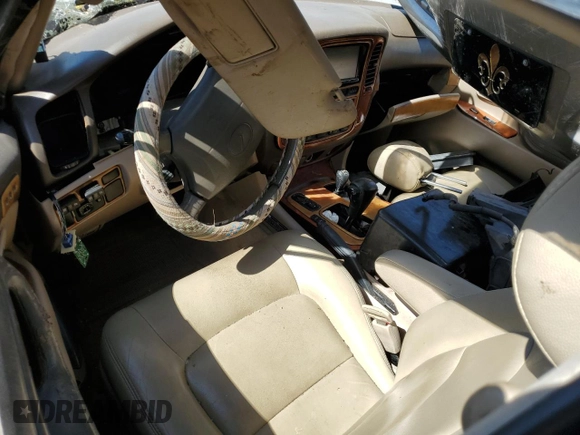 1999 Lexus LX 470 z VIN JT6HT00W7X0030287, wystawiony jako Copart lot #48482945 z przebiegiem 258 794 mil mil oraz Szkoda całkowita • Salvage title. Historia ofert i sprzedaży dostępna na DreamBid. Obrazek 8.