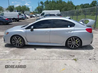 2021 Subaru WRX STI with VIN JF1VA2E66M9822014, listed as a IAAI auction lot 42499316 with 55,625 mi miles and . Bid and sale history available at DreamBid. Image 14.
