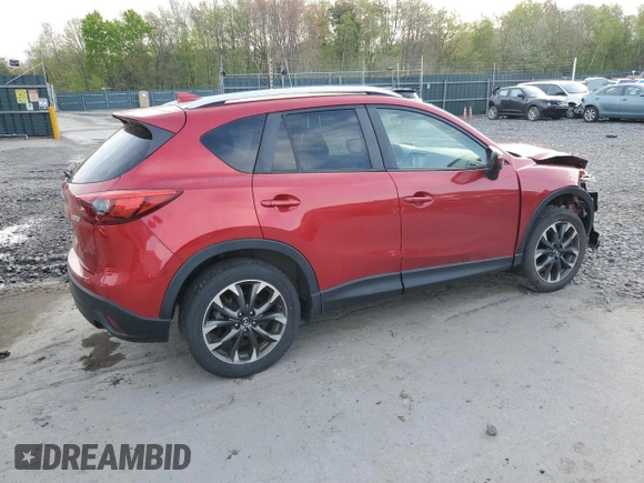 2016 Mazda CX-5 Grand Touring with VIN JM3KE4DY6G0753826, listed as a Copart auction lot 55391555 with 96,852 mi miles and Salvage Title. Bid and sale history available at DreamBid. Image 3.