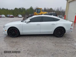 2014 Audi A7 Premium Plus z VIN WAUWGAFC0EN083417, wystawiony jako IAAI lot #41350273 z przebiegiem 163 402 mil mil oraz . Historia ofert i sprzedaży dostępna na DreamBid. Obrazek 14.