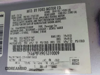 2016 Ford Mustang EcoBoost with VIN 1FA6P8TH9G5310009, listed as a IAAI auction lot 41652774 with 112,713 mi miles. Bid and sale history available at carsss.com. Image 9.