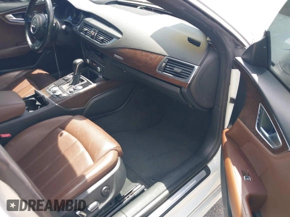 2016 Audi A7 3.0 Prestige with VIN WAU2GAFCXGN102993, listed as a IAAI auction lot 42099259 with 64,490 mi miles. Bid and sale history available at carsss.com. Image 5.