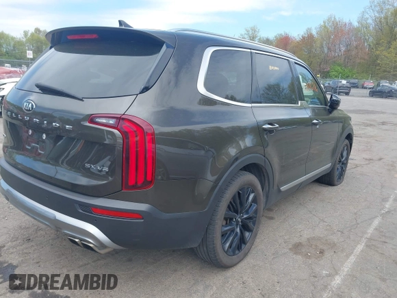 2021 Kia Telluride SX with VIN 5XYP5DHC6MG164200, listed as a IAAI auction lot 42176716 with 143,783 mi miles and . Bid and sale history available at DreamBid. Image 4.